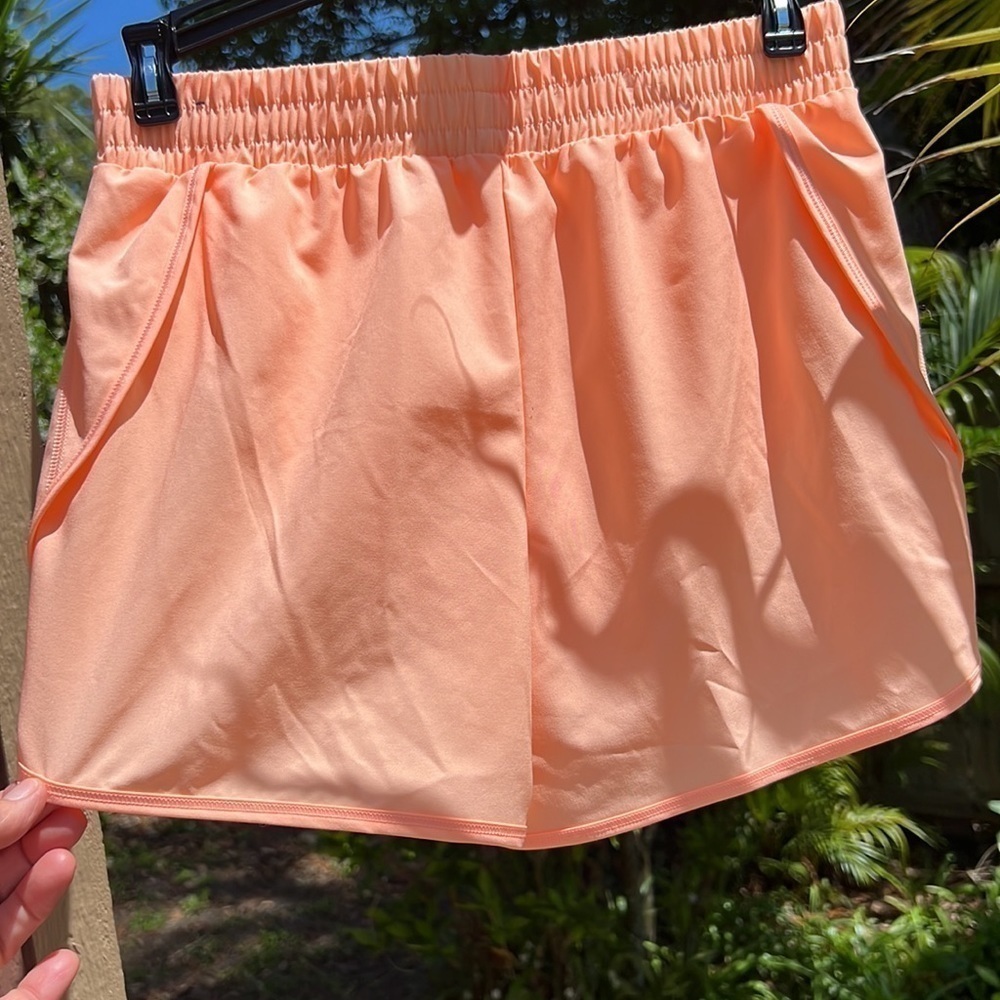 DSG Girls peach colored running shorts. Never worn, but washed once